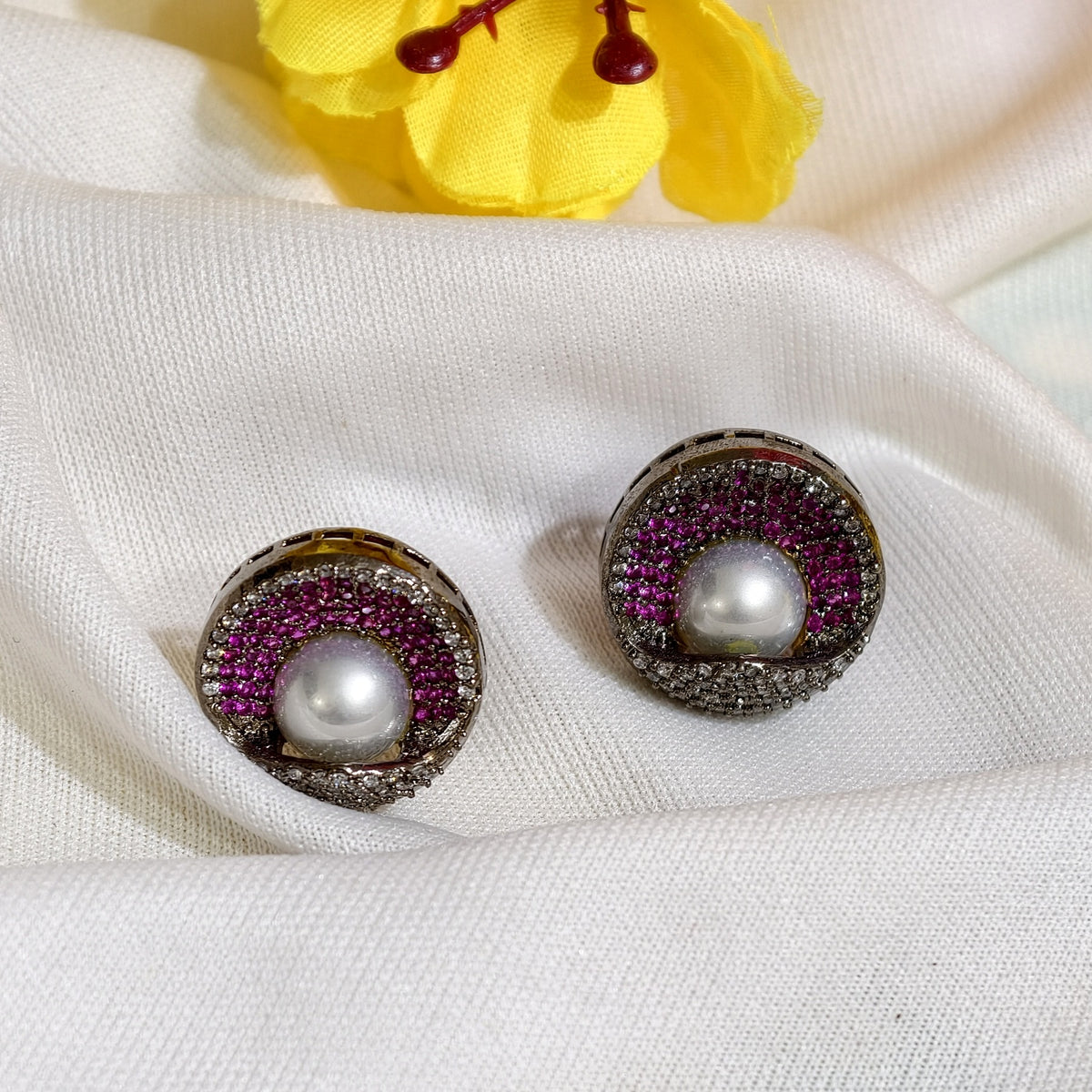 Close-up of Pink Nano Setting AD Pearl Centre Stud Earrings