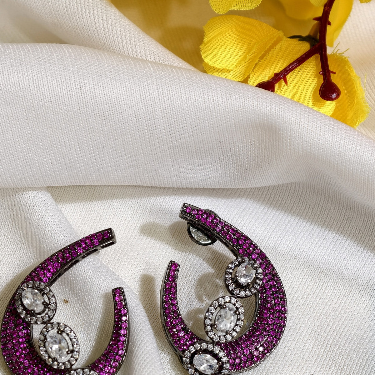 Close-up of Ruby Pink Nano Setting AD Crescent Earrings