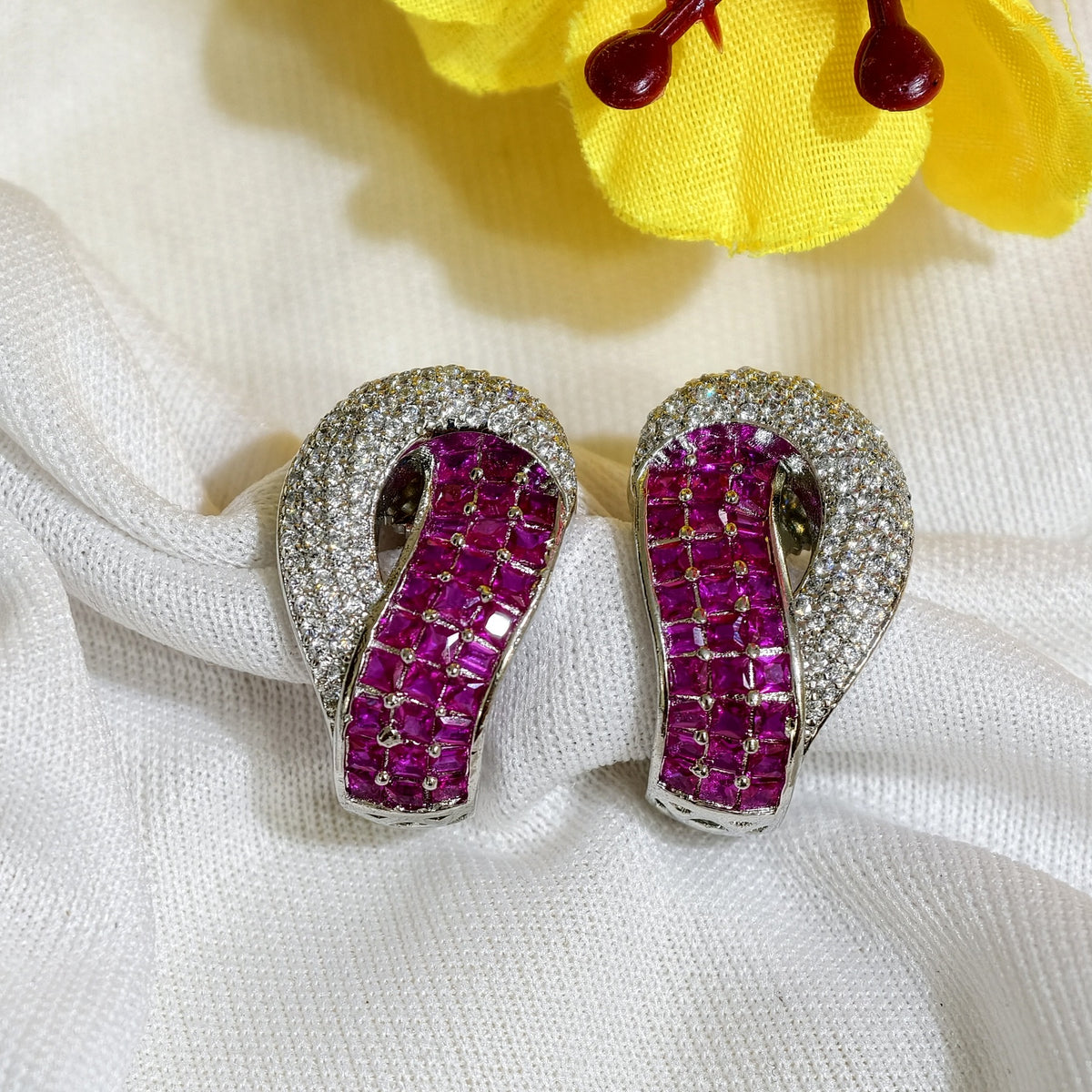 Close-up of Ruby Pink Nano Setting AD Huggie Earrings