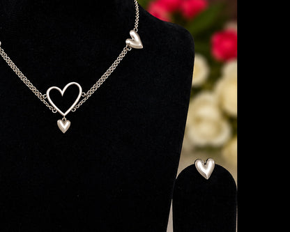 Close-up of silver replica heart necklace pendant details