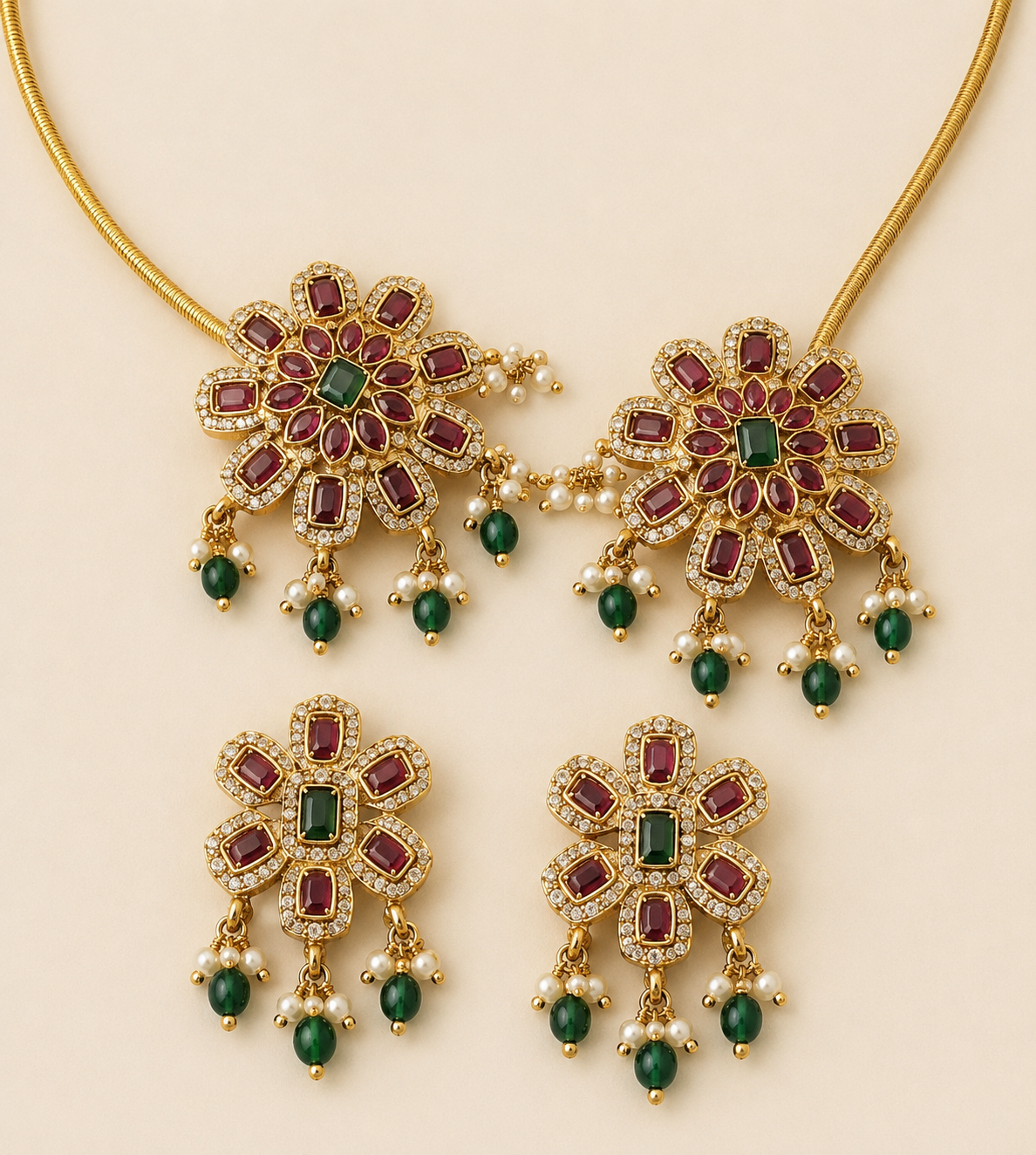 Close detail of floral CZ and Kemp stone Hasli necklace and earrings