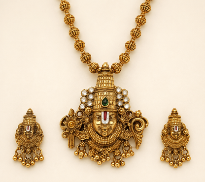 Close detail of Venkateshwara pendant and matching earrings
